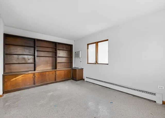 an empty room with a empty shelves