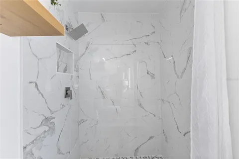 a utility room with sink dryer and washer