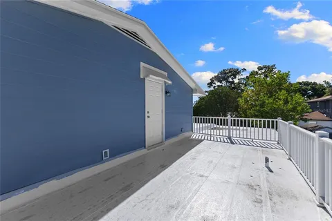 a bathroom with a bath tub sink mirror and vanity