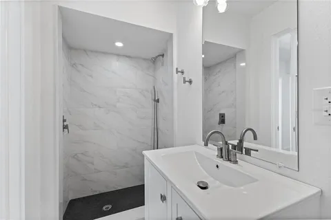 a view of a swimming pool with a patio