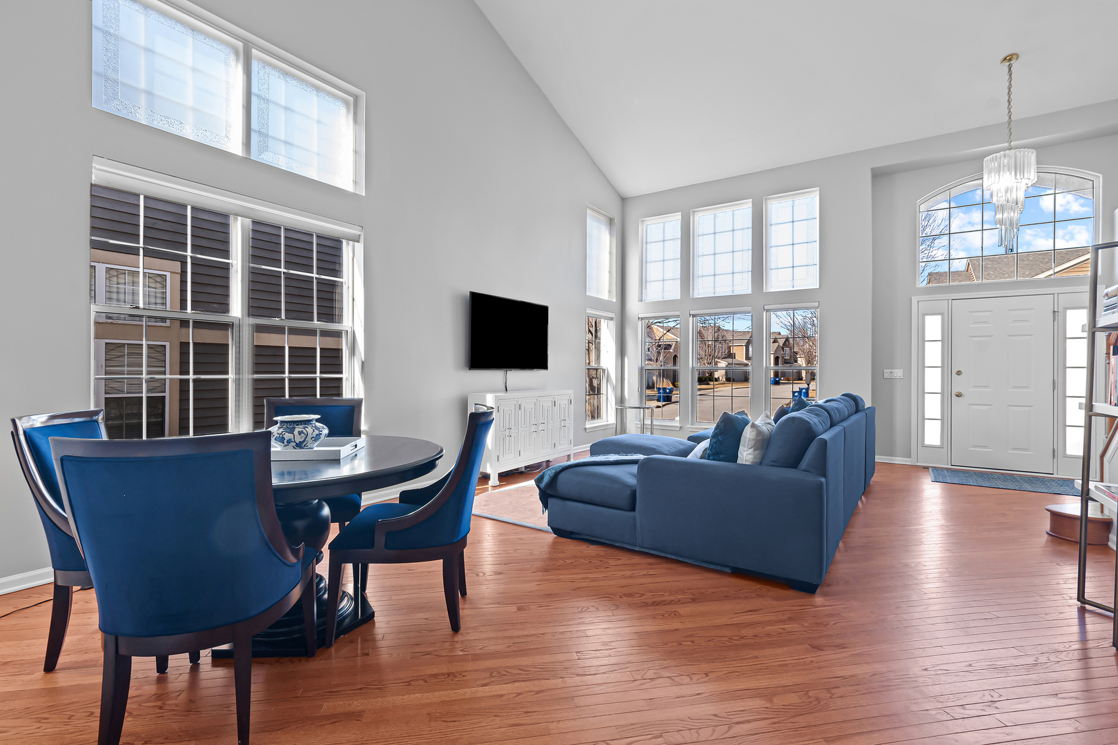 4319 Exeter Lane Northbrook, IL 60062 - Photo 4 of 24 a living room with furniture floor to ceiling window and wooden floor