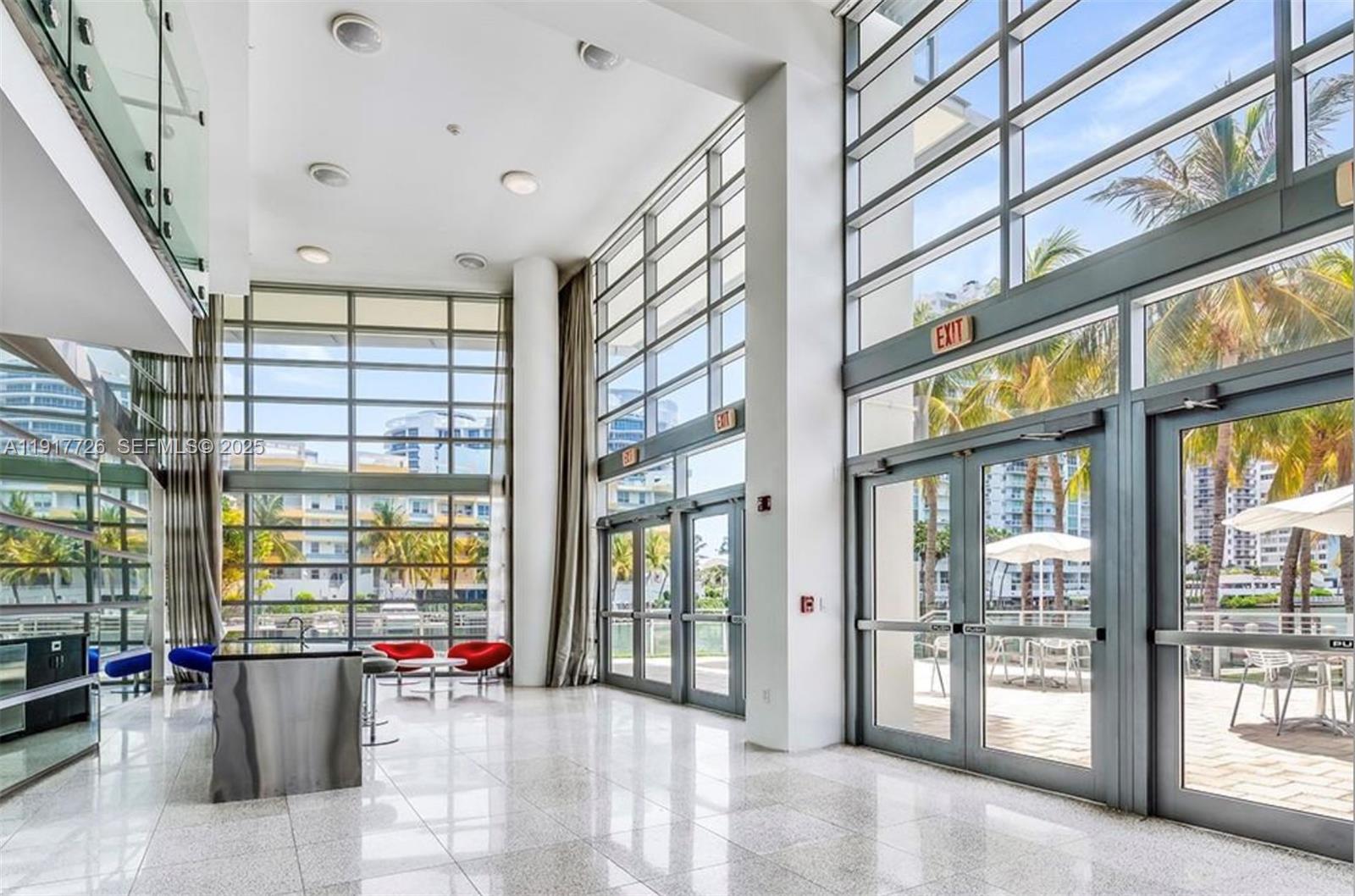 201 Aqua Avenue, Unit 801 Miami Beach, FL 33141 - Photo 41 of 49 a view of an entryway with a floor to ceiling window