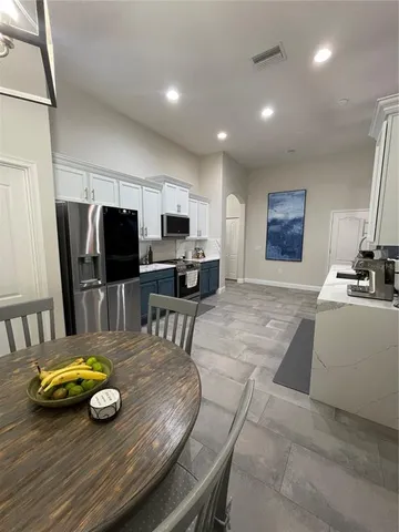 a view of a dining room with furniture