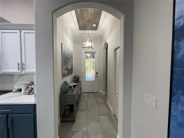 a en suite bathroom with a sink and a mirror