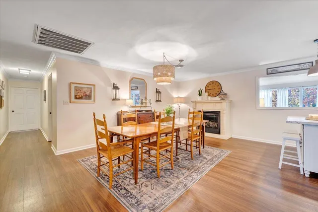 a bathroom with a sink toilet and mirror