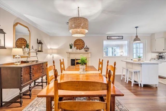 a bedroom with a bed dresser and a window