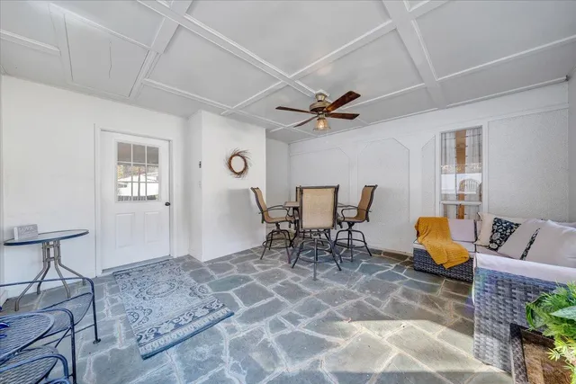 a view of a swimming pool with a patio