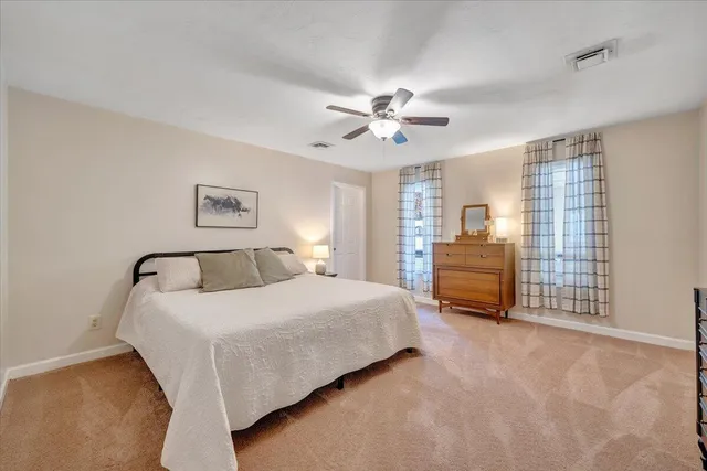 a front view of house with yard and seating area