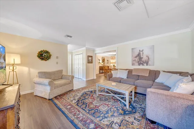 a view of a chair and table in a balcony