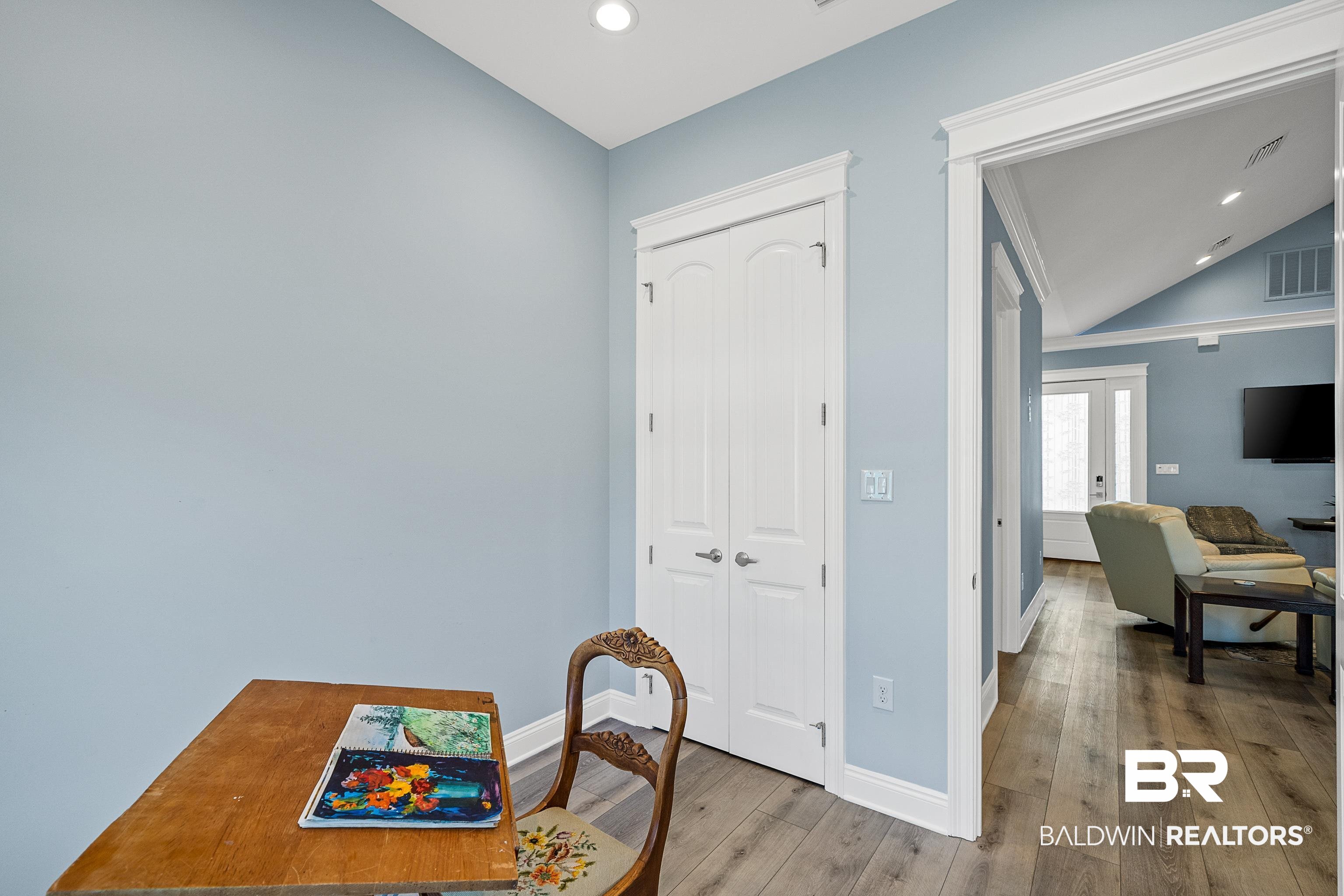 12329 Reunion Place, Unit LOT 38 Foley, AL 36535 - Photo 19 of 43 Dining space with vaulted ceiling, wood finished floors, recessed lighting, and french doors