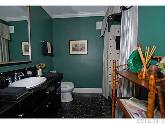 1943 Harris Road Charlotte, NC 28211 - Photo 15 of 16 a bathroom with a sink toilet and a mirror