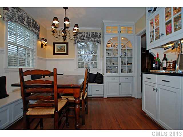 1943 Harris Road Charlotte, NC 28211 - Photo 6 of 16 a view of a dining room with furniture and chandelier