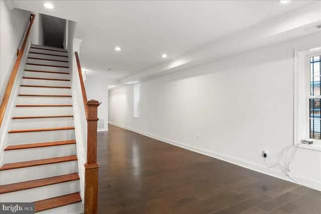 a view of entryway with wooden floor