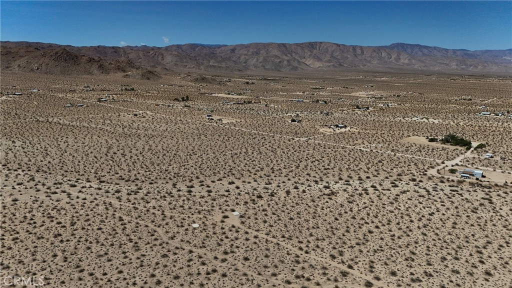 775 Manzanita Road Johnson Valley, CA 92285 - Photo 11 of 15 Red boundary lines on pictures are an estimate and for marketing purposes only. Buyer to verify all aspects of this property including, but not limited to utilities, assessments, boundaries, usage, access, and zoning to satisfy themselves.