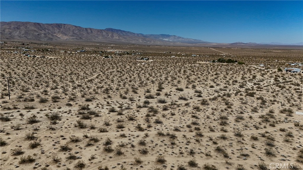775 Manzanita Road Johnson Valley, CA 92285 - Photo 12 of 15 Red boundary lines on pictures are an estimate and for marketing purposes only. Buyer to verify all aspects of this property including, but not limited to utilities, assessments, boundaries, usage, access, and zoning to satisfy themselves.