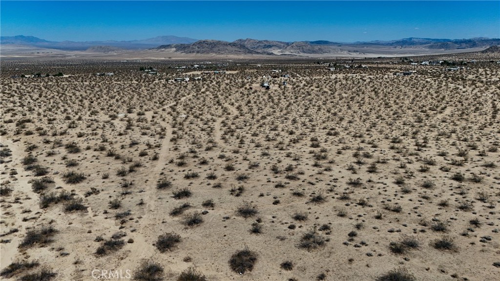 775 Manzanita Road Johnson Valley, CA 92285 - Photo 13 of 15 Red boundary lines on pictures are an estimate and for marketing purposes only. Buyer to verify all aspects of this property including, but not limited to utilities, assessments, boundaries, usage, access, and zoning to satisfy themselves.