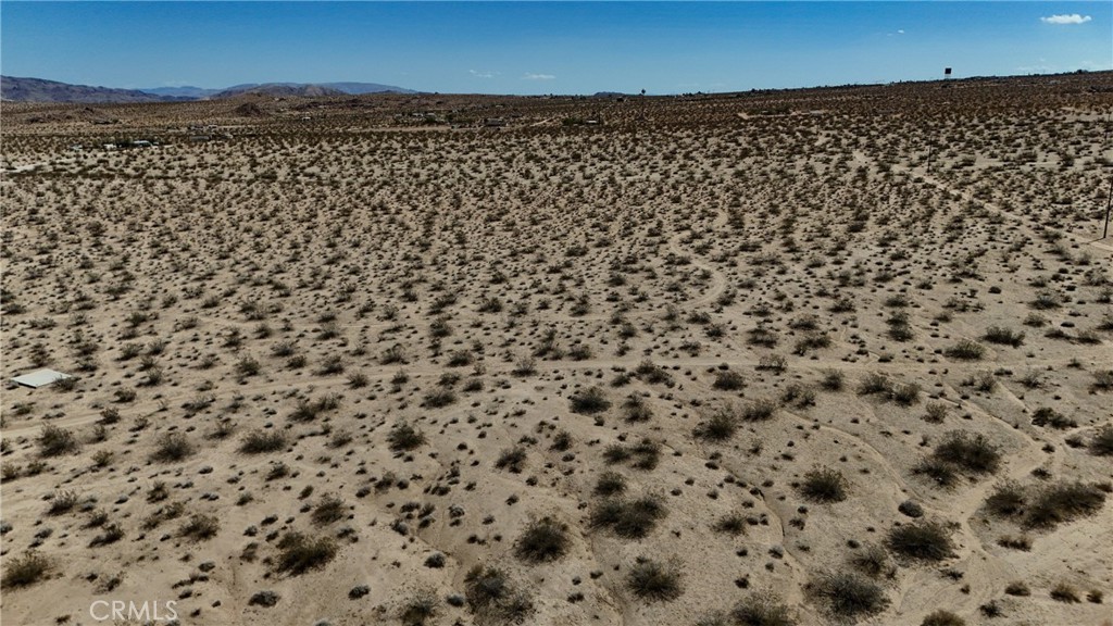 775 Manzanita Road Johnson Valley, CA 92285 - Photo 14 of 15 Red boundary lines on pictures are an estimate and for marketing purposes only. Buyer to verify all aspects of this property including, but not limited to utilities, assessments, boundaries, usage, access, and zoning to satisfy themselves.