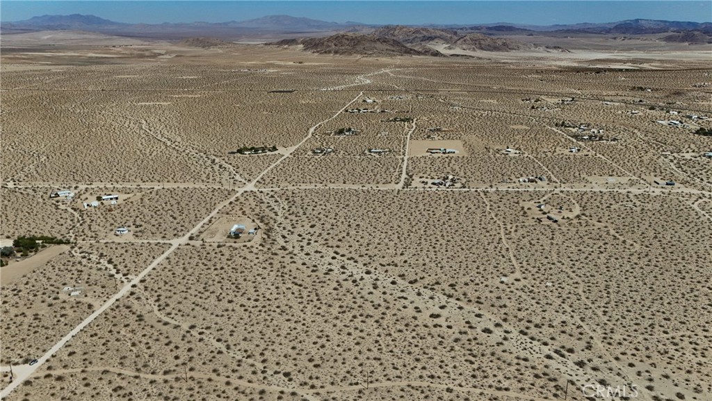 775 Manzanita Road Johnson Valley, CA 92285 - Photo 2 of 15 Red boundary lines on pictures are an estimate and for marketing purposes only. Buyer to verify all aspects of this property including, but not limited to utilities, assessments, boundaries, usage, access, and zoning to satisfy themselves.