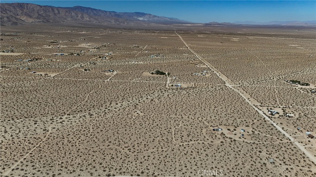 775 Manzanita Road Johnson Valley, CA 92285 - Photo 7 of 15 Red boundary lines on pictures are an estimate and for marketing purposes only. Buyer to verify all aspects of this property including, but not limited to utilities, assessments, boundaries, usage, access, and zoning to satisfy themselves.