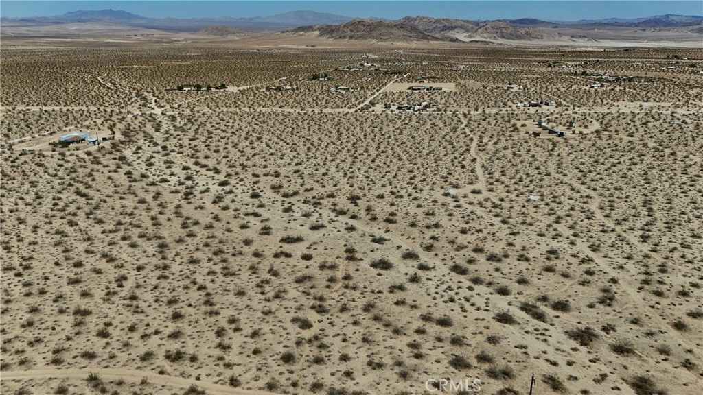 775 Manzanita Road Johnson Valley, CA 92285 - Photo 8 of 15 Red boundary lines on pictures are an estimate and for marketing purposes only. Buyer to verify all aspects of this property including, but not limited to utilities, assessments, boundaries, usage, access, and zoning to satisfy themselves.