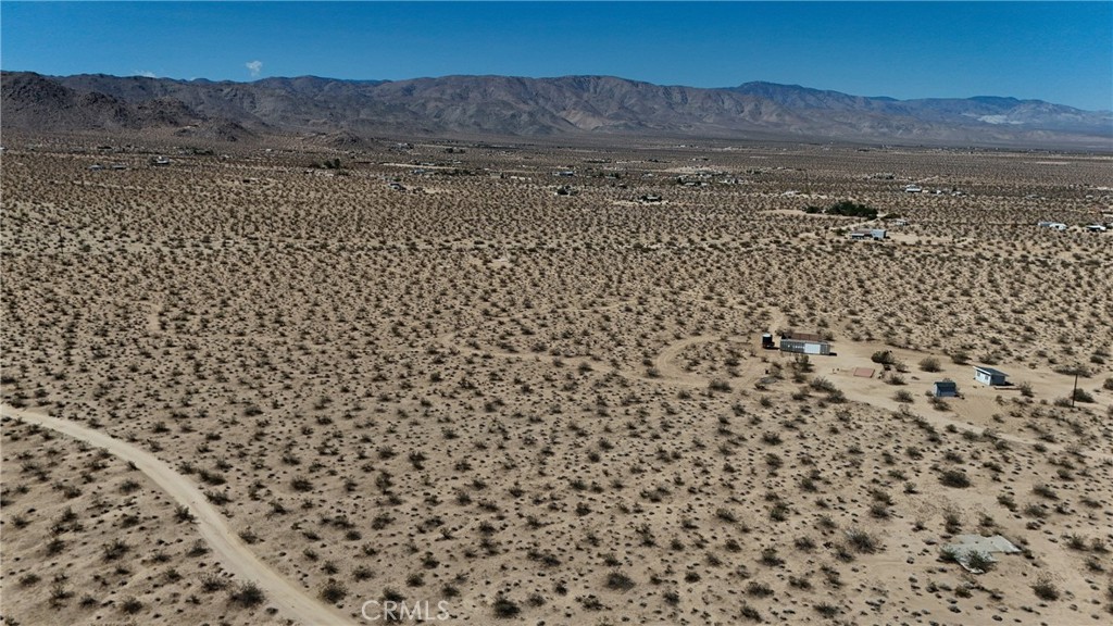 775 Manzanita Road Johnson Valley, CA 92285 - Photo 10 of 15 Red boundary lines on pictures are an estimate and for marketing purposes only. Buyer to verify all aspects of this property including, but not limited to utilities, assessments, boundaries, usage, access, and zoning to satisfy themselves.