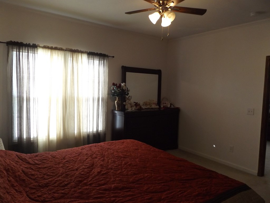 707 Ruby Street Jackson, SC 29831 - Photo 25 of 35 a bedroom with a bed and a window