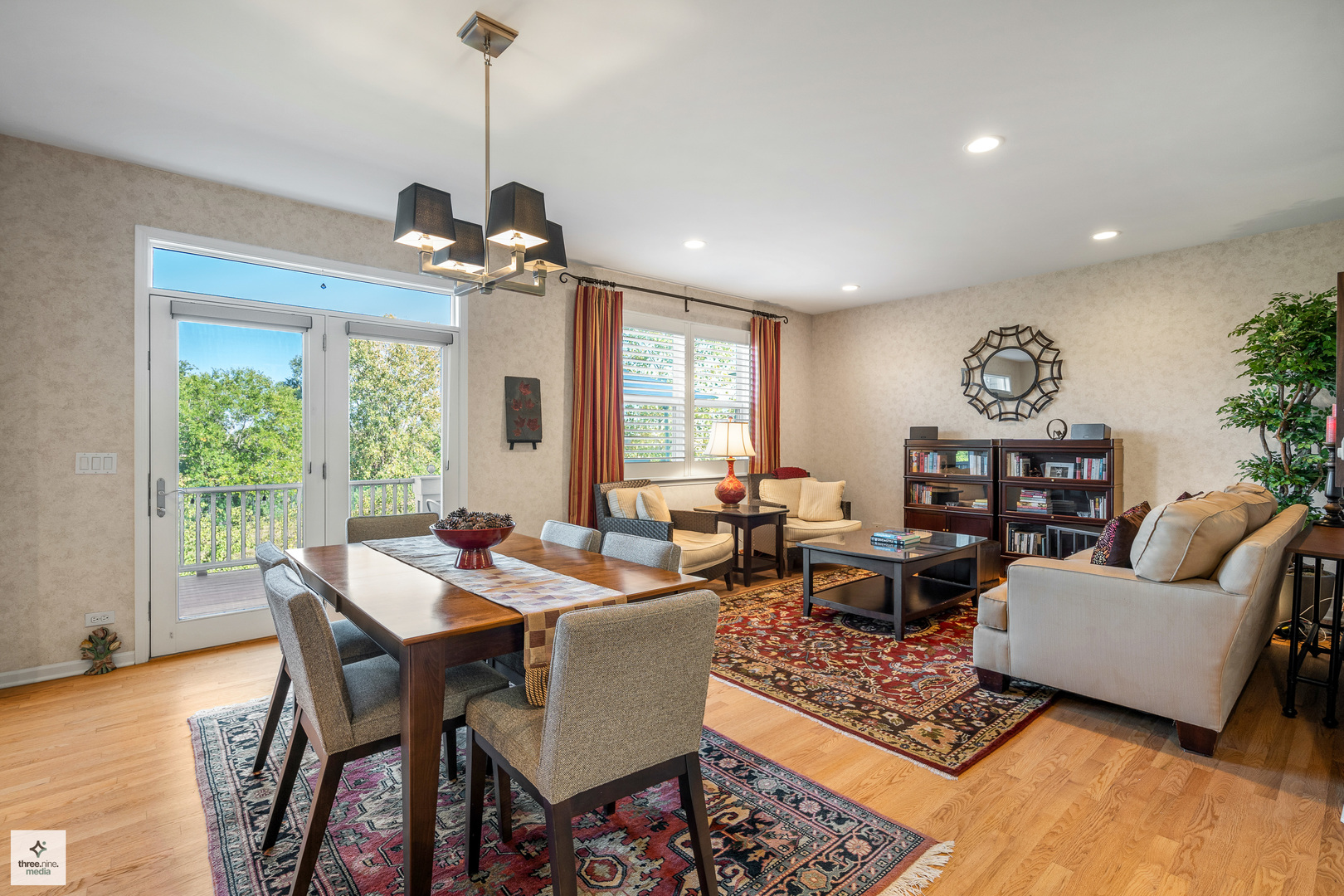 705 Lyster Road Highwood, IL 60040 - Photo 7 of 24 a living room with furniture and a chandelier