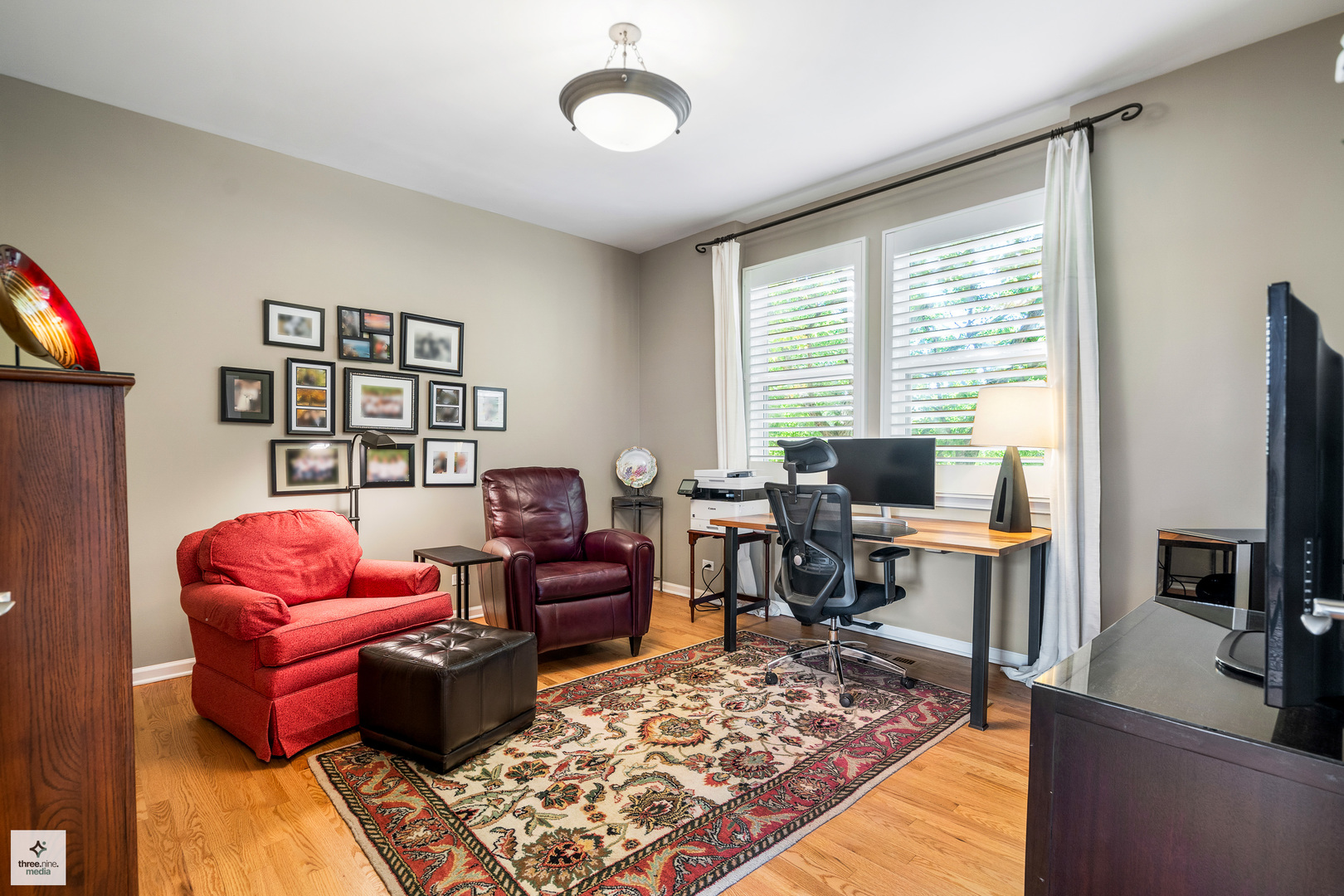 705 Lyster Road Highwood, IL 60040 - Photo 10 of 24 a living room with furniture a rug and a window