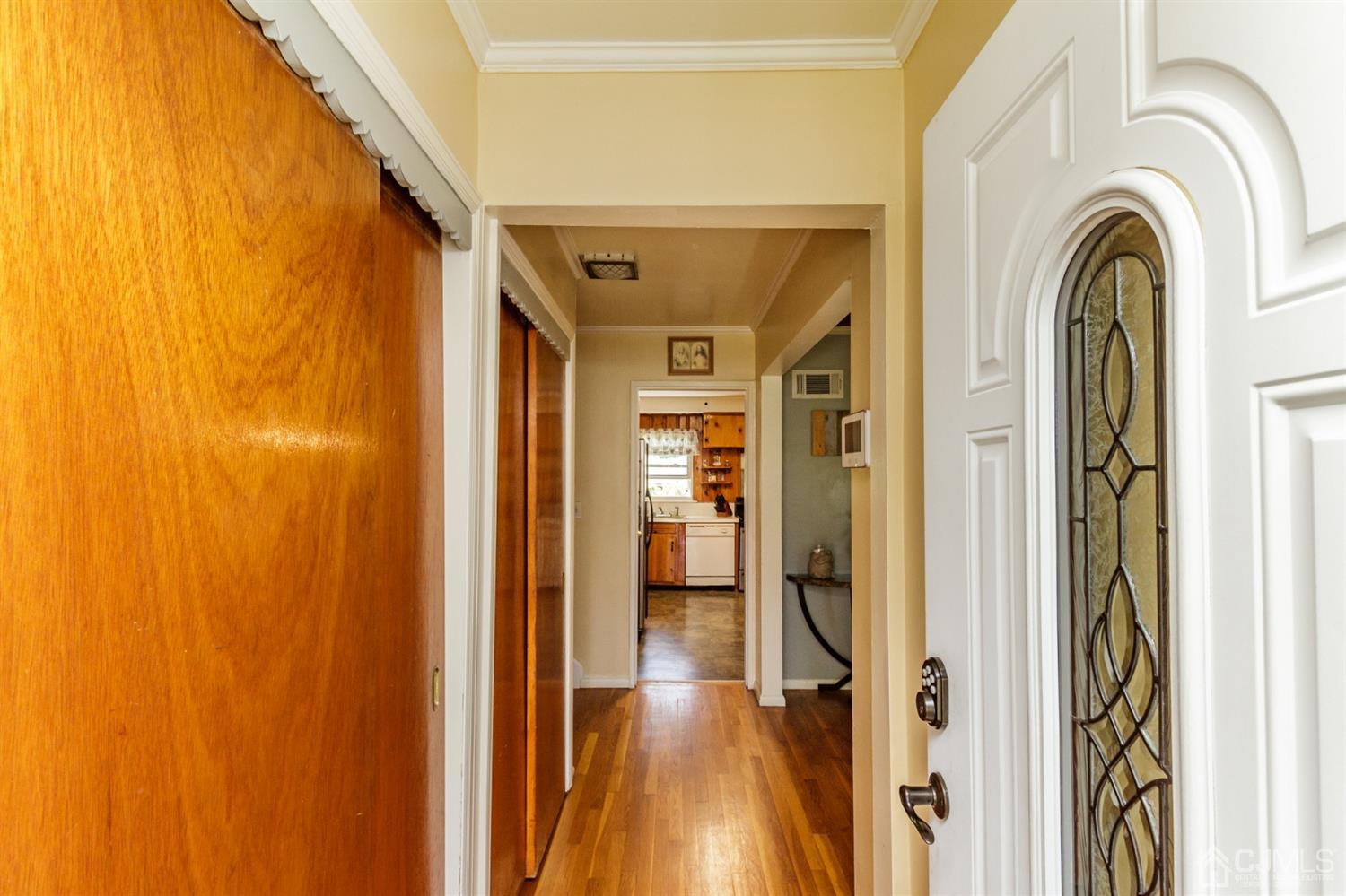 709 Exeter Road Linden, NJ 07036 - Photo 3 of 28 a view of walk in closet with wooden floor