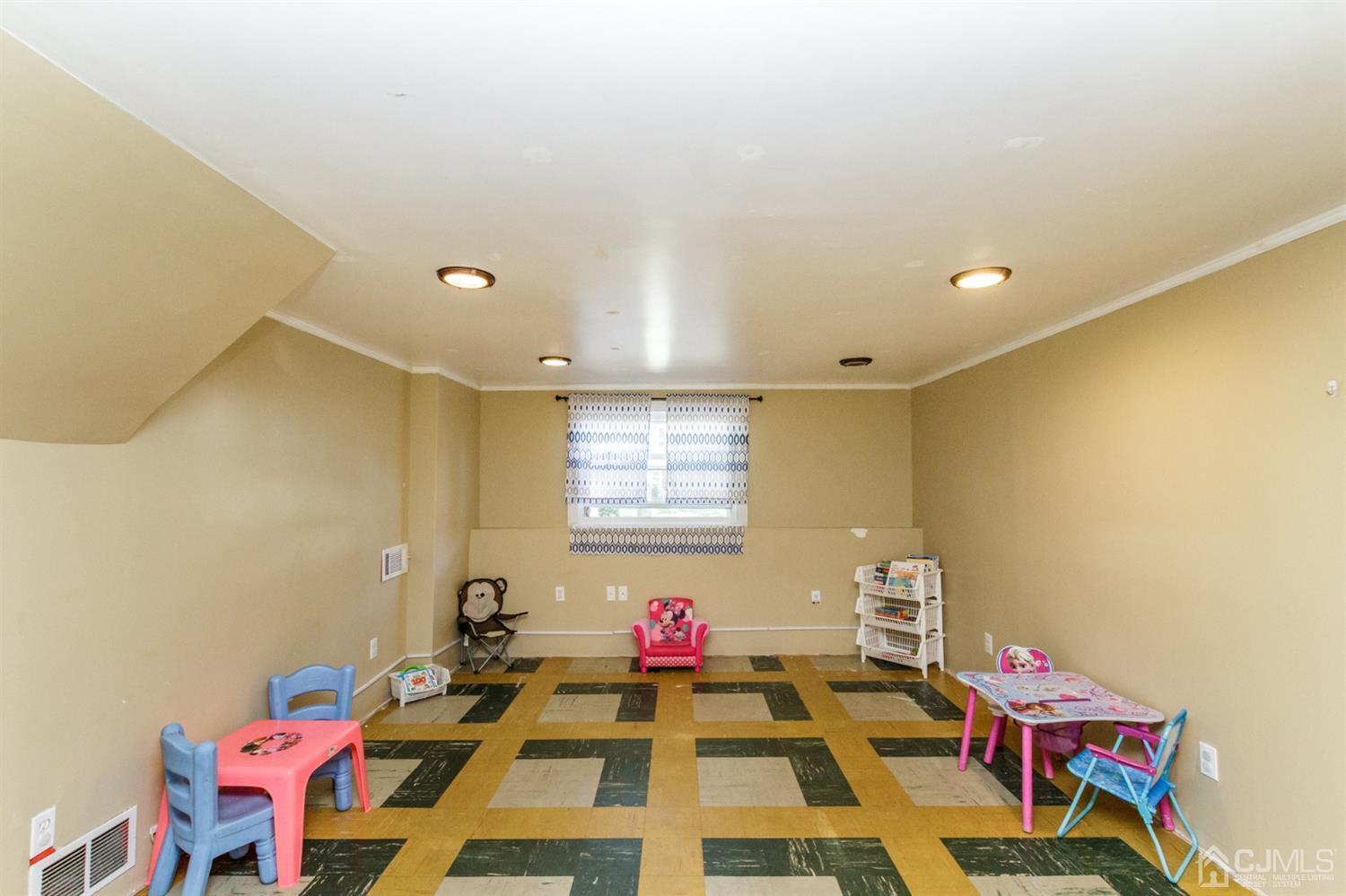 709 Exeter Road Linden, NJ 07036 - Photo 22 of 28 a room with furniture and a pool table