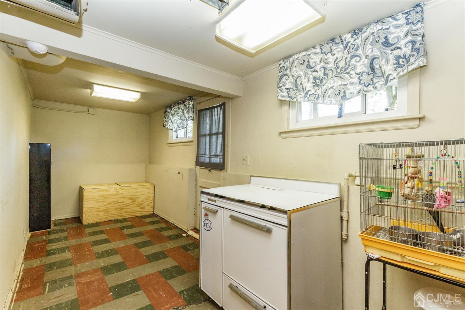 709 Exeter Road Linden, NJ 07036 - Photo 24 of 28 a utility room with dryer and washer