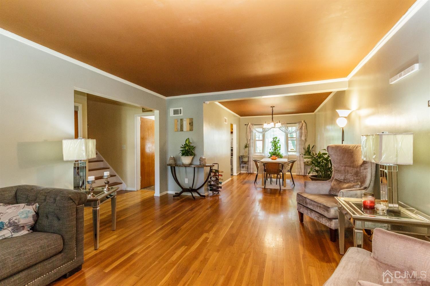 709 Exeter Road Linden, NJ 07036 - Photo 6 of 28 a living room with furniture and a wooden floor