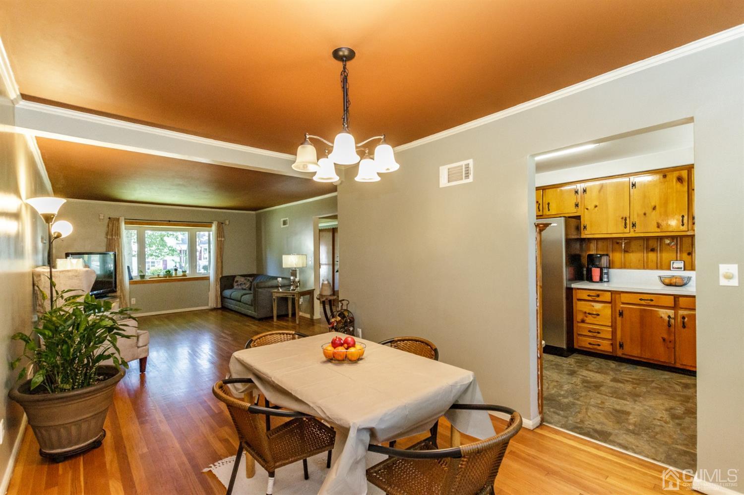 709 Exeter Road Linden, NJ 07036 - Photo 8 of 28 a view of a dining room with furniture window and wooden floor