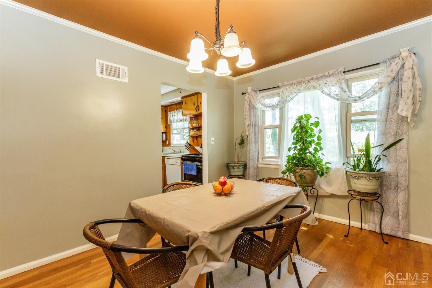 709 Exeter Road Linden, NJ 07036 - Photo 9 of 28 a view of a dining room with furniture window and wooden floor
