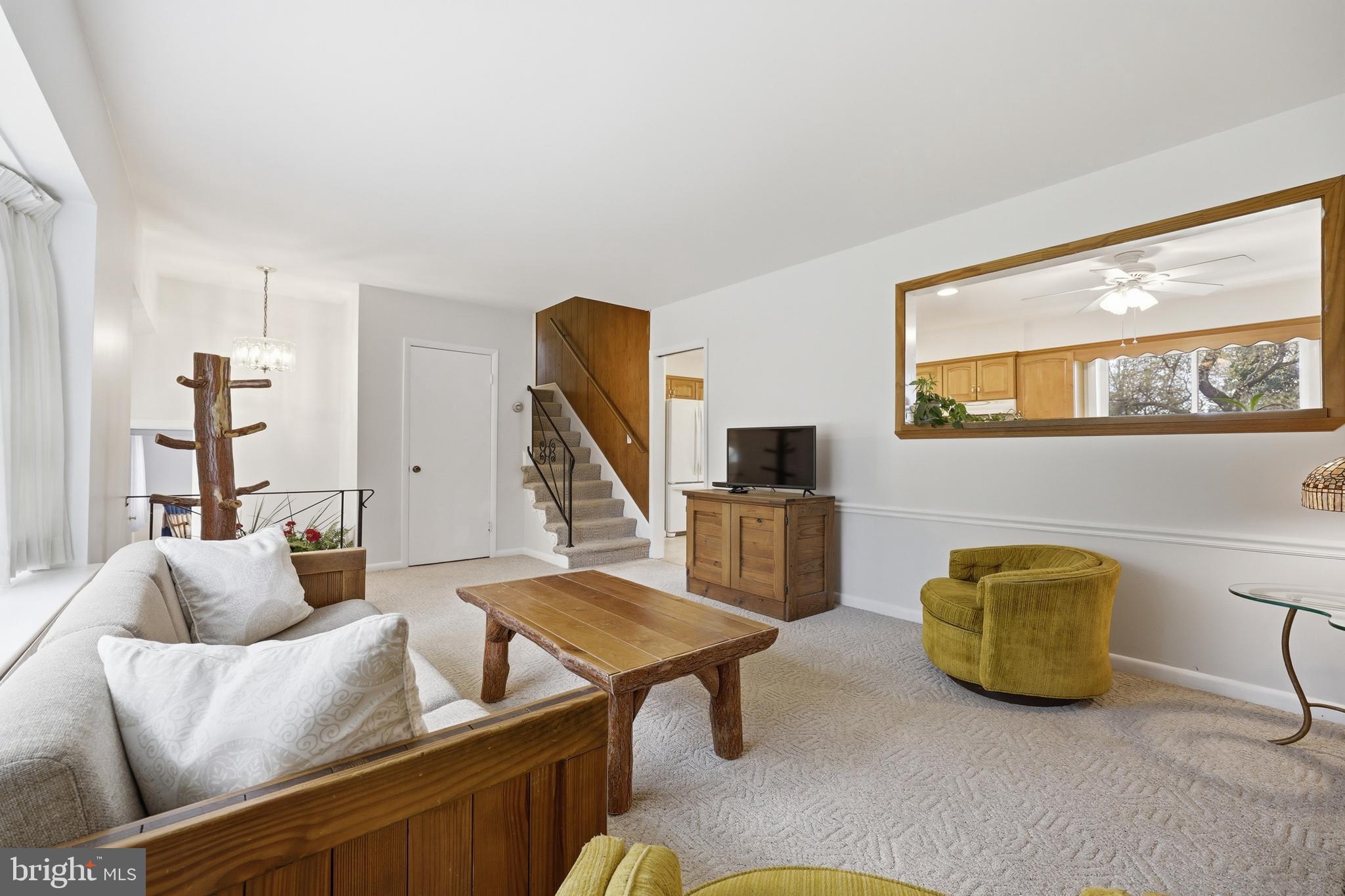 1814 Marymont Road Silver Spring, MD 20906 - Photo 8 of 44 living room into kitchen, stairs to 4th level