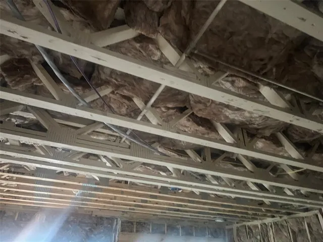 a view of a refrigerator with wooden floor