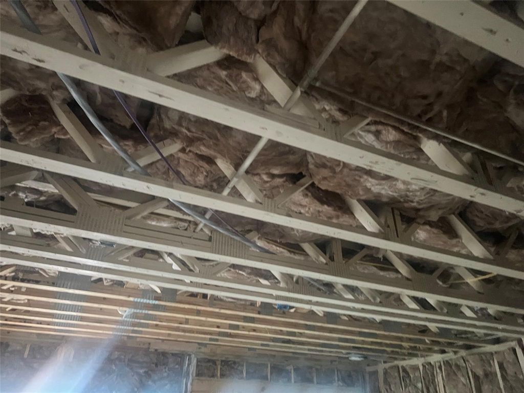 2668 Bering Drive, Unit 2668 Houston, TX 77057 - Photo 15 of 47 a view of a refrigerator with wooden floor