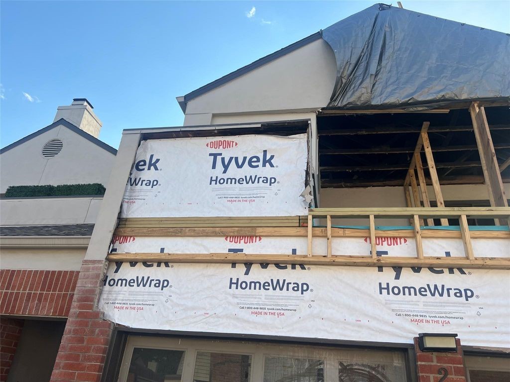 2668 Bering Drive, Unit 2668 Houston, TX 77057 - Photo 19 of 47 a black and white photo of a building