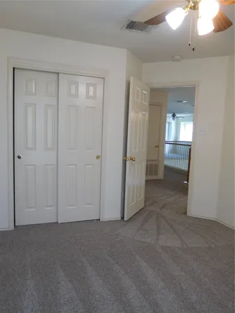 an empty room with a bathroom