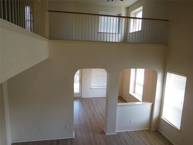 a house view with a sitting space and garden