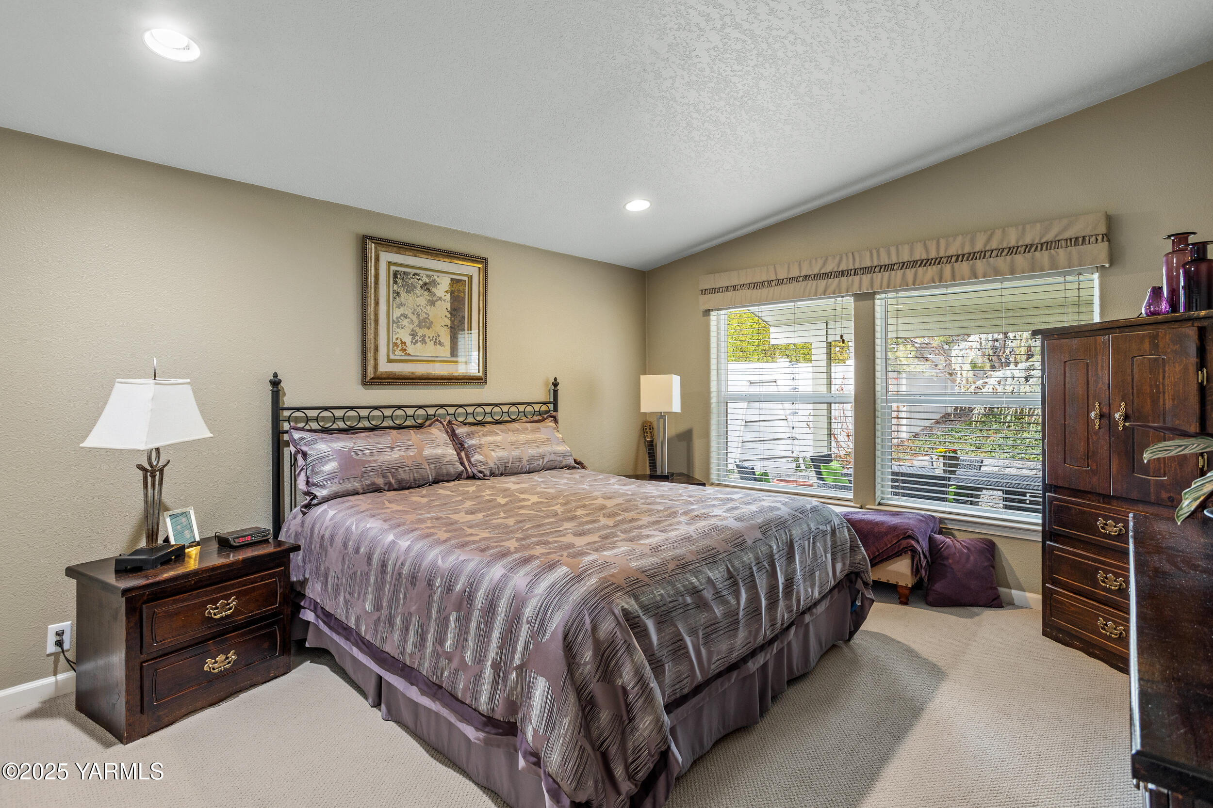 200 Bridle Way, Unit 203 Yakima, WA 98901 - Photo 14 of 36 a bedroom with a bed and a window