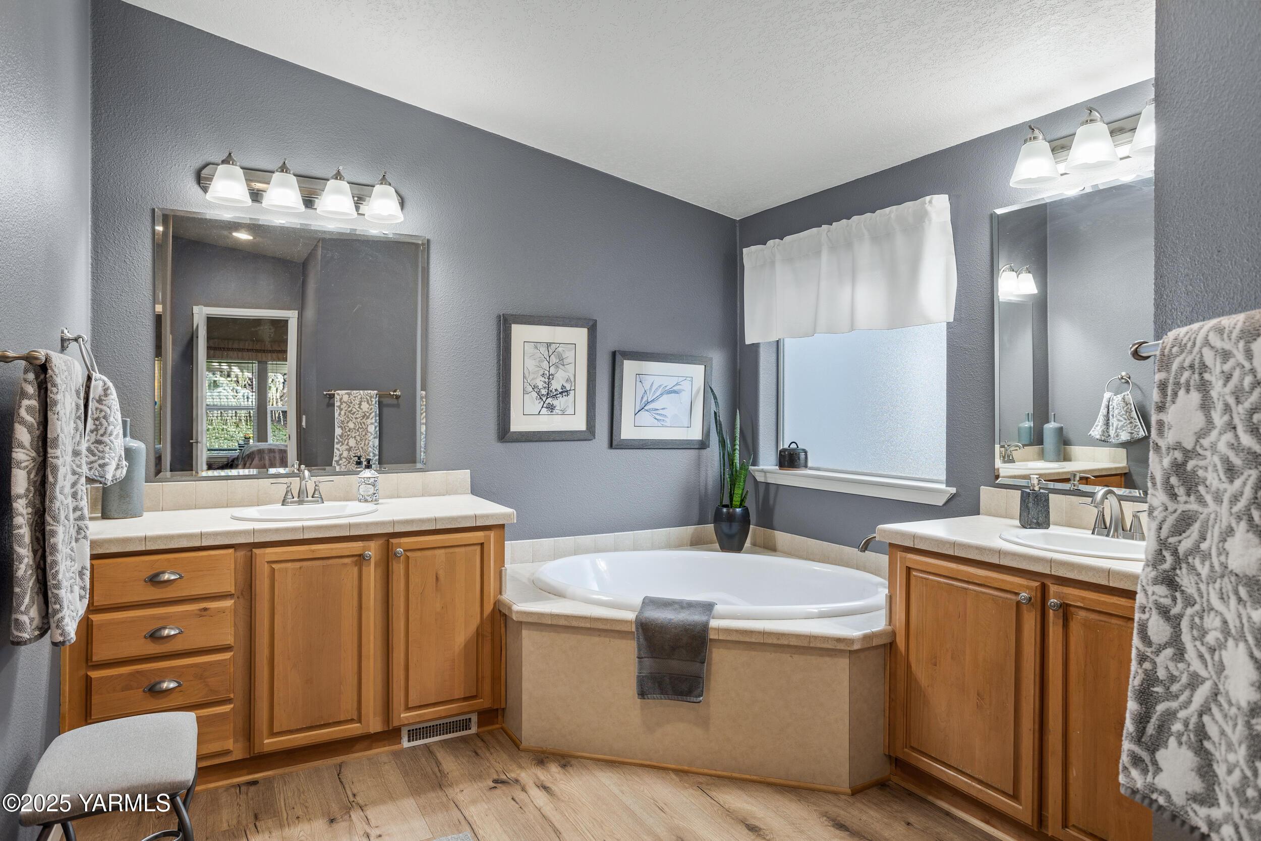 200 Bridle Way, Unit 203 Yakima, WA 98901 - Photo 17 of 36 a bathroom with a sink double vanity granite and a mirror