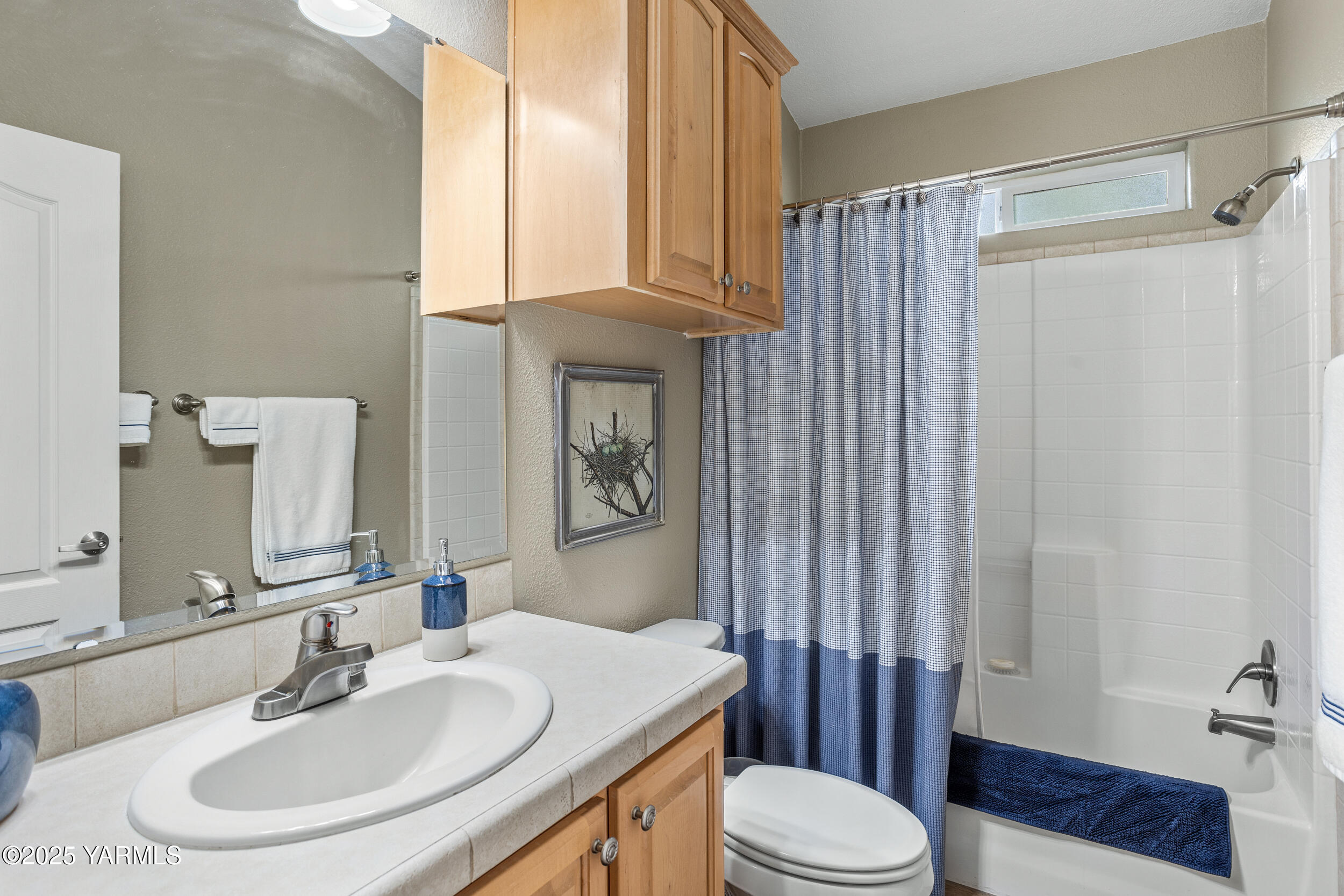 200 Bridle Way, Unit 203 Yakima, WA 98901 - Photo 21 of 36 a bathroom with a sink toilet and shower