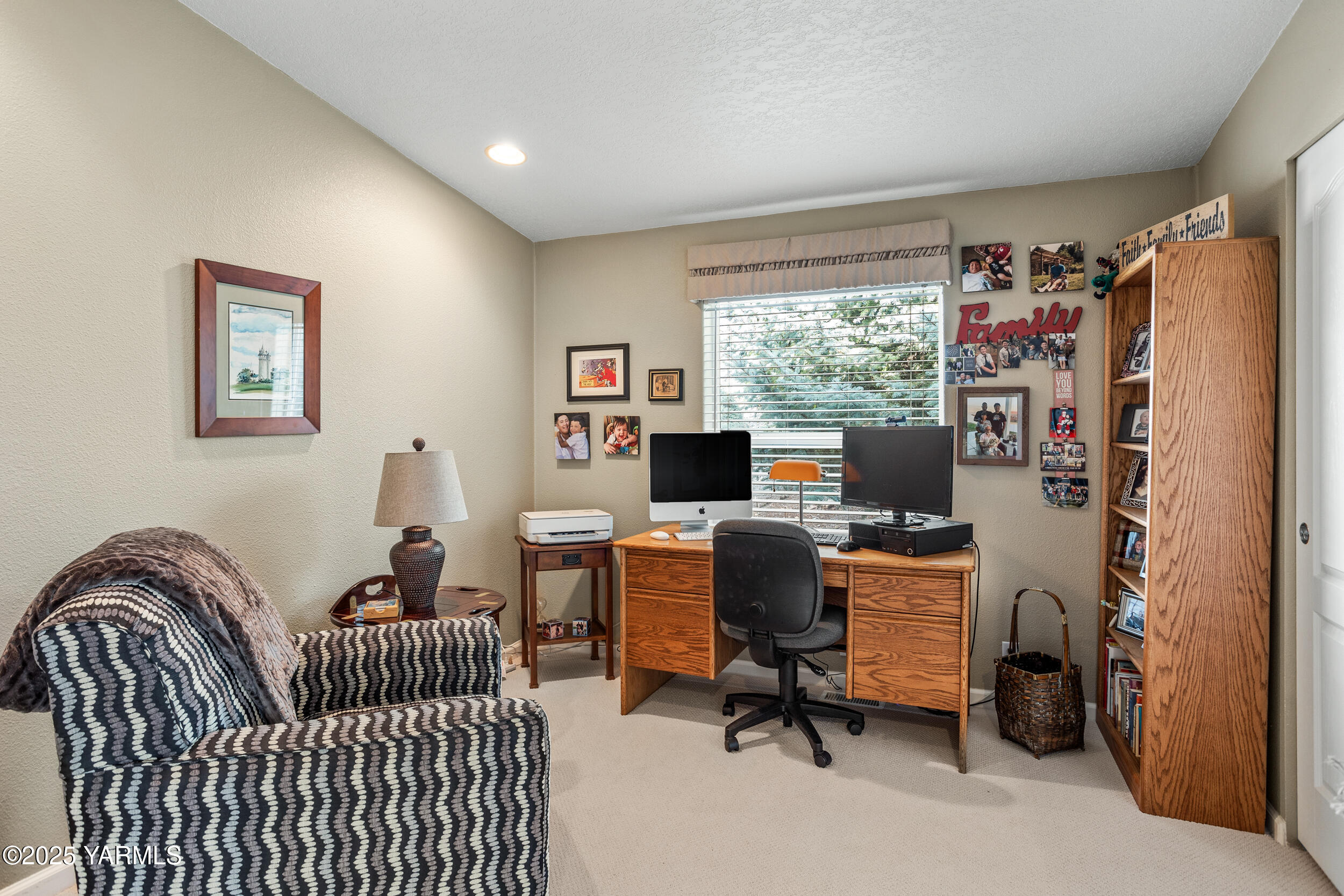 200 Bridle Way, Unit 203 Yakima, WA 98901 - Photo 22 of 36 a view of a workspace with furniture and a window
