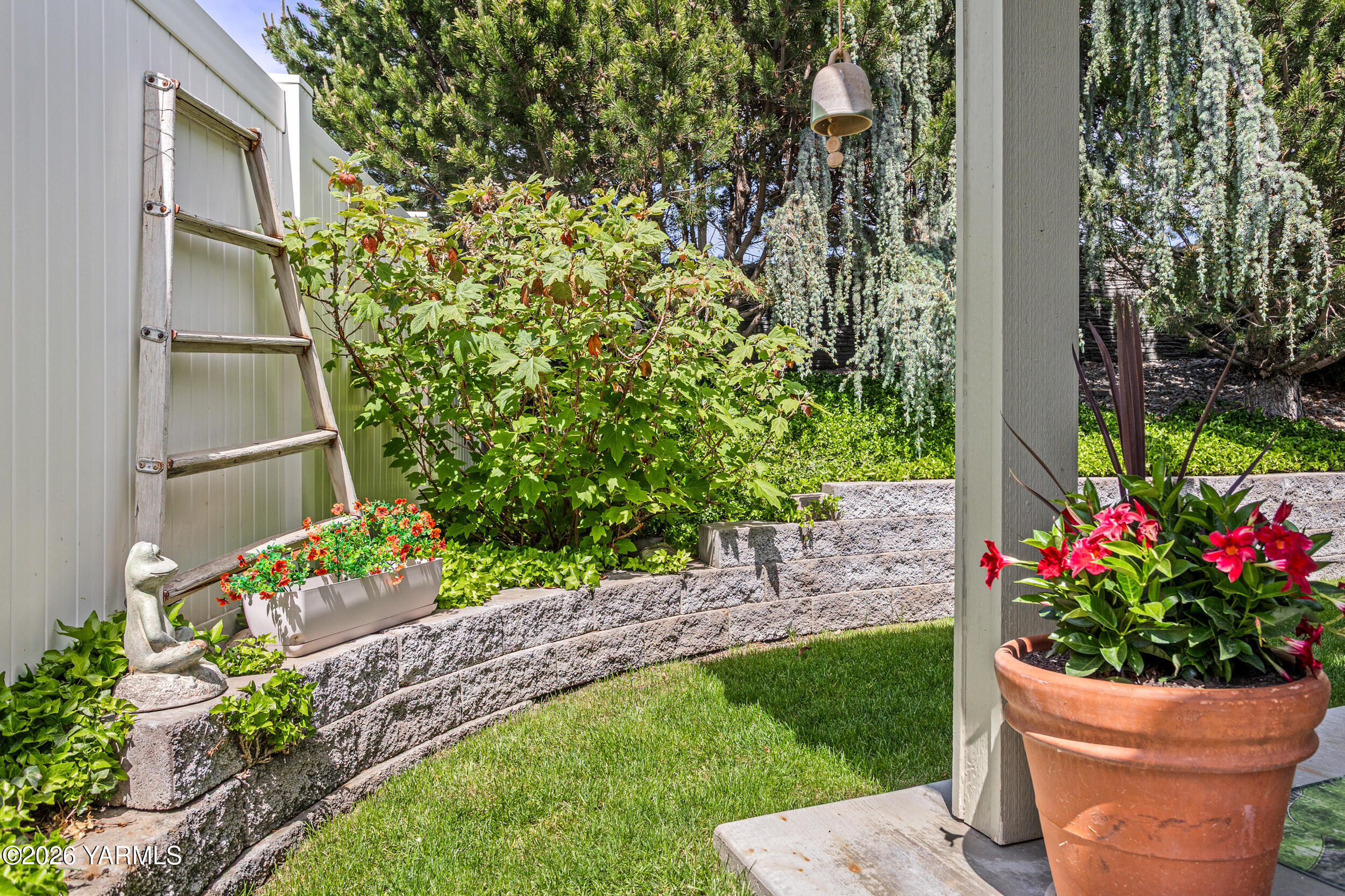 200 Bridle Way, Unit 203 Yakima, WA 98901 - Photo 30 of 36 a view of a backyard with garden