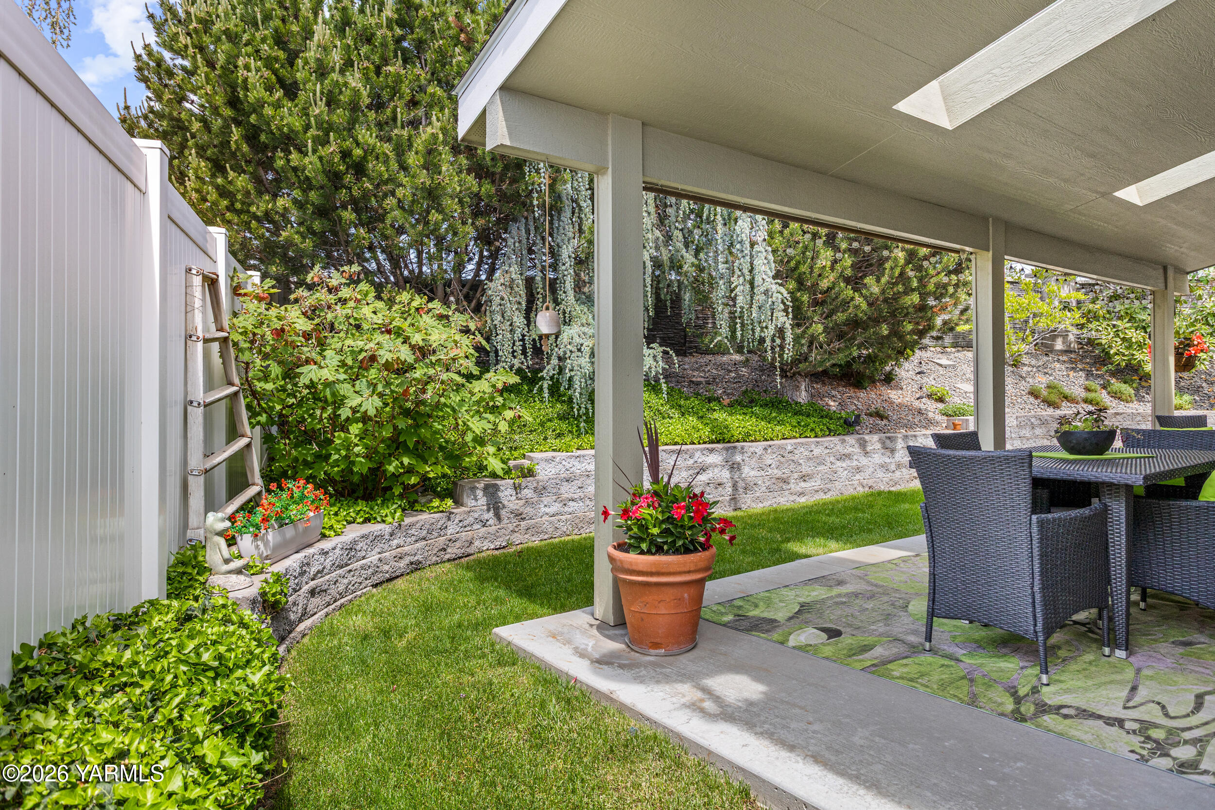 200 Bridle Way, Unit 203 Yakima, WA 98901 - Photo 31 of 36 a view of a potted plants in backyard of a house