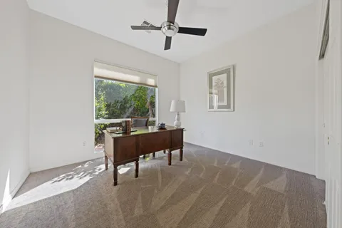 a room with furniture and a window