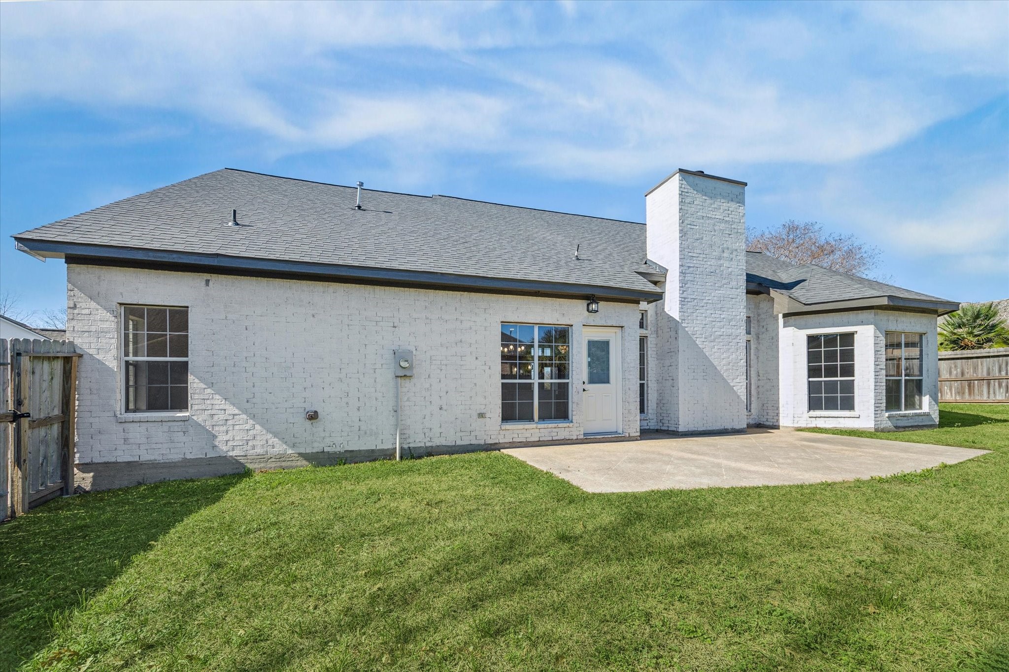 5437 Edgewater Court Willis, TX 77318 - Photo 27 of 29 a house view with a garden space