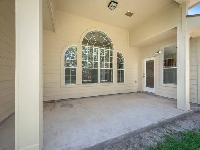 a view of backyard with tree