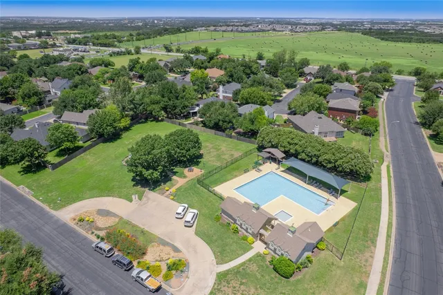 a picture of a bathroom with a shower